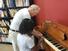 /images/business/GYAC volunteer playing the piano with a student-resized_thumbnail.jpg